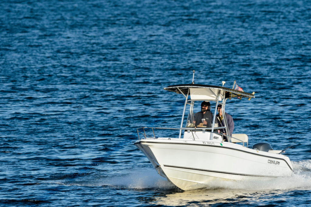 Boat cruising along the Cape Town coastline