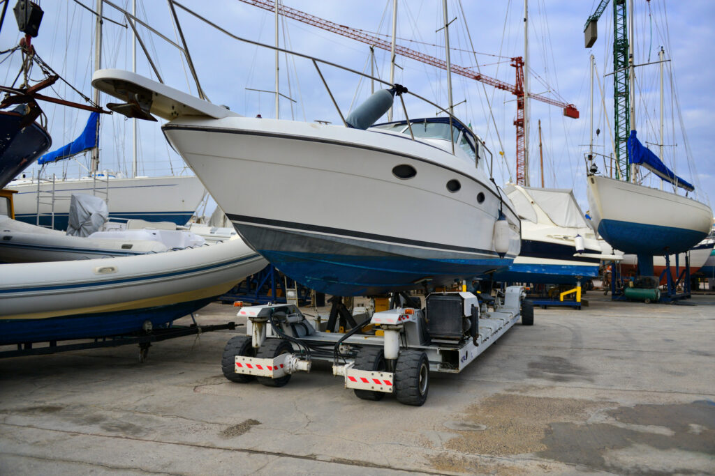 A boat sits on a dry dock on a trailer in Cape Town